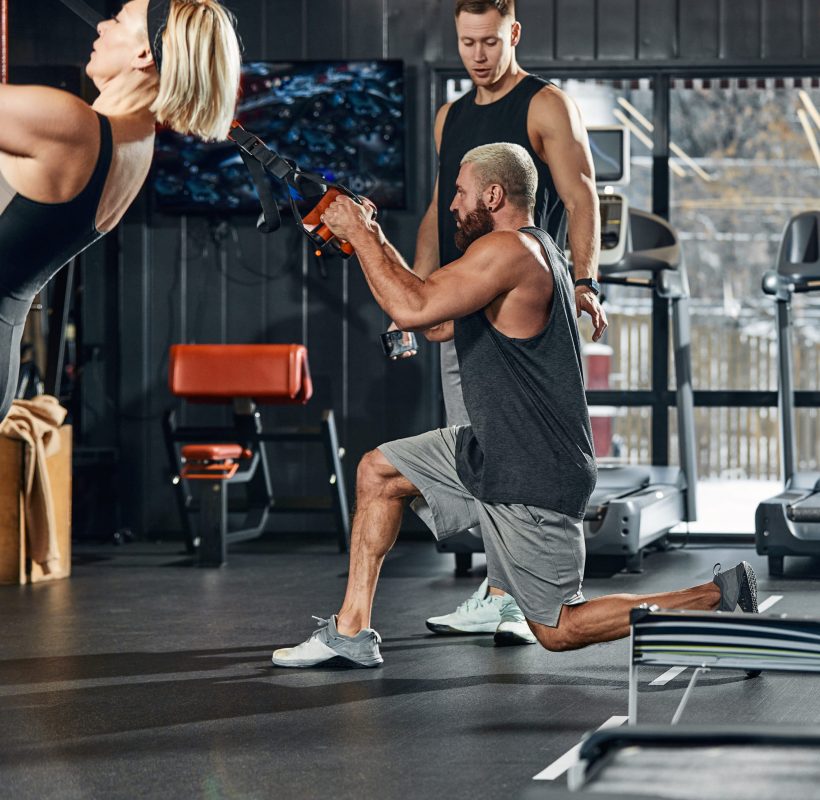 Fitness Gym friend having fun with in the gym, team work and togetherness concept
